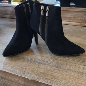Suede black zip up bootie heels